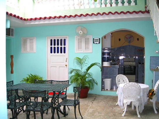 'Patio interior y cocina' Casas particulares are an alternative to hotels in Cuba. Check our website cubaparticular.com often for new casas.